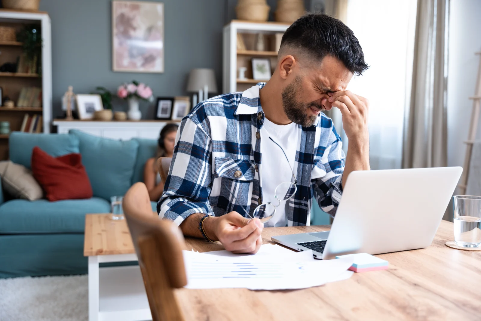 Man stressed at his laptop – online psychiatry in Corvallis, OR